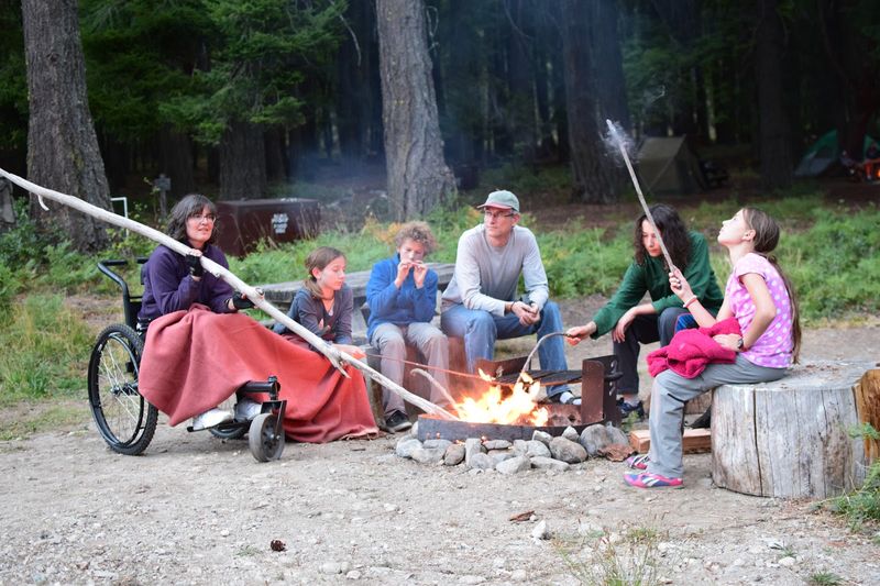 Jenny Schmitz group camping with GRIT Freedom Chair 